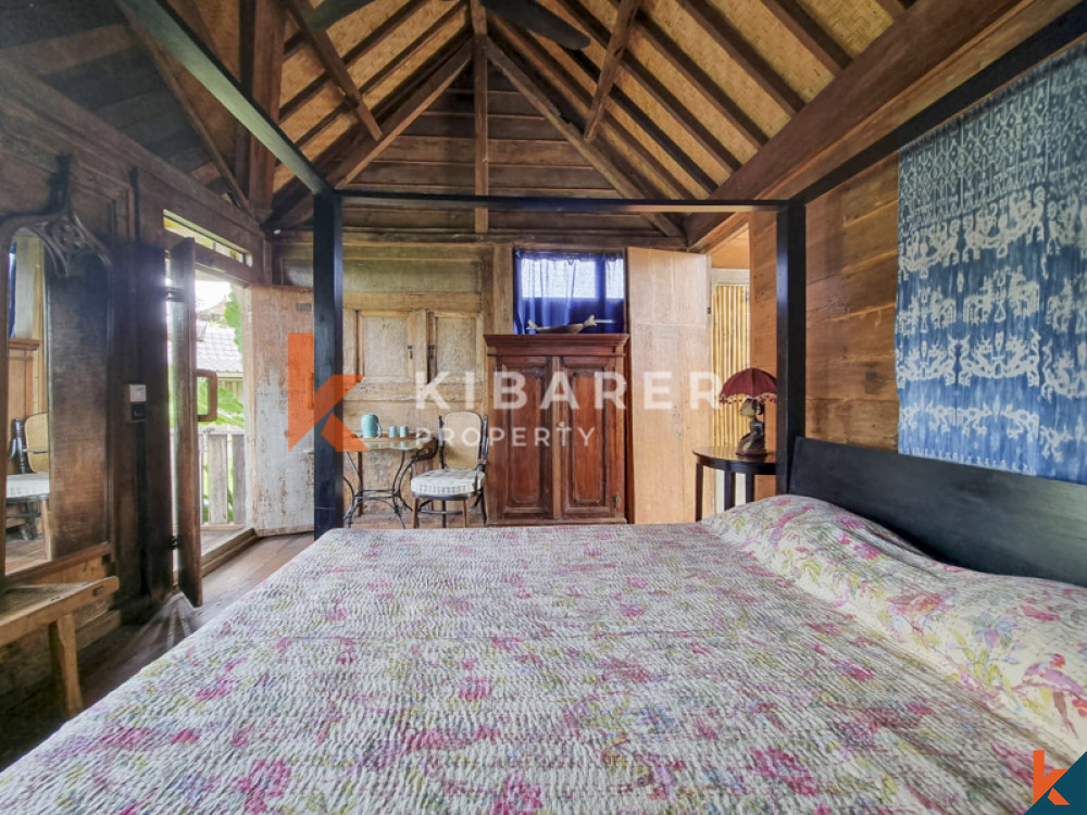Traditional Four Bedrooms Closed Living Joglo with Rice Field View In Cemagi — image 12