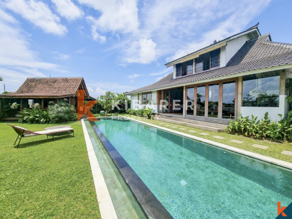 Traditional Four Bedrooms Closed Living Joglo with Rice Field View In Cemagi