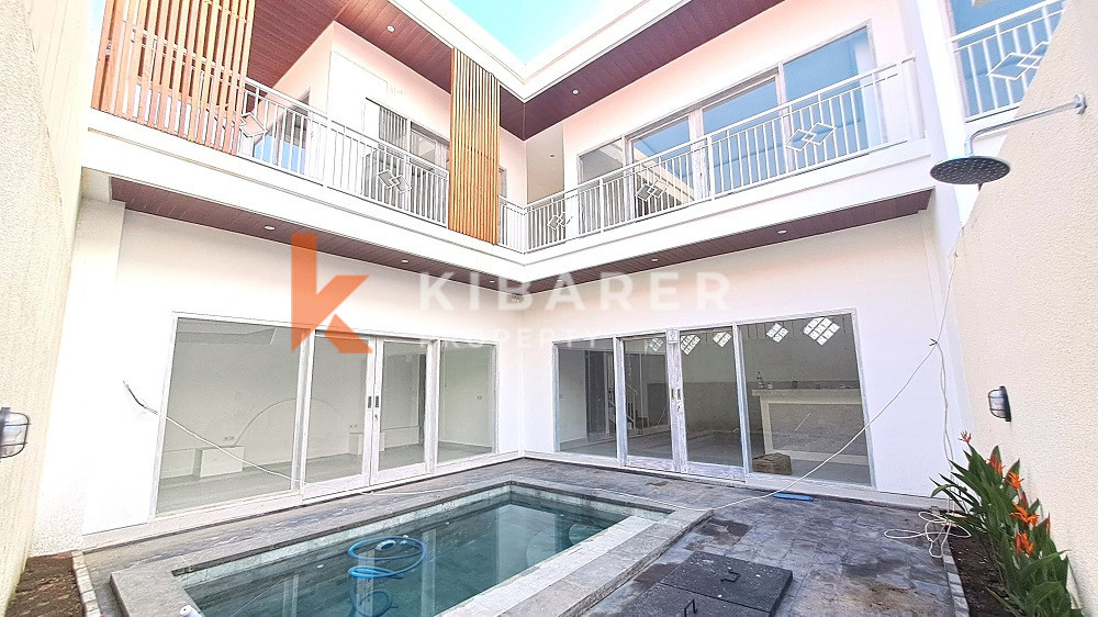 Unfurnished Three-Bedroom Gated Villa with Balcony in Canggu Area