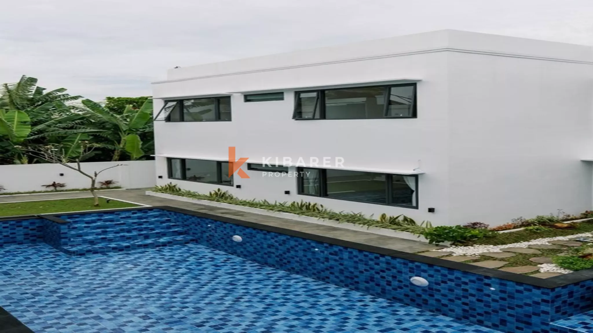 Modern Two-Bedroom Furnished Villa with Shared Pool in Denpasar — image 1