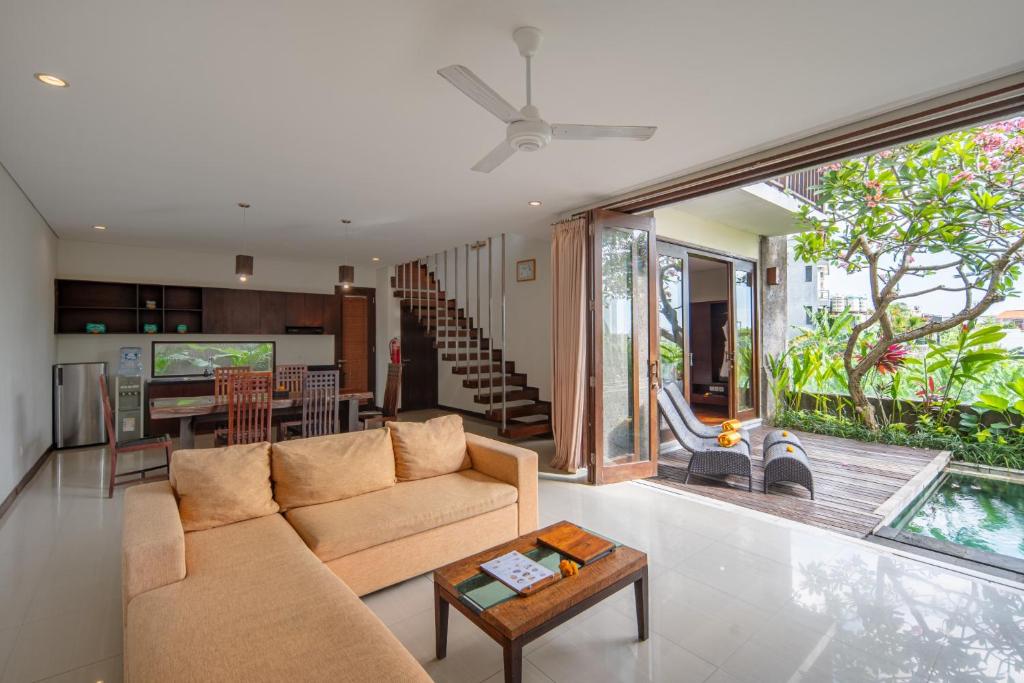 Sunlit Balcony Escape 3 Bedroom Private Villa in Canggu
