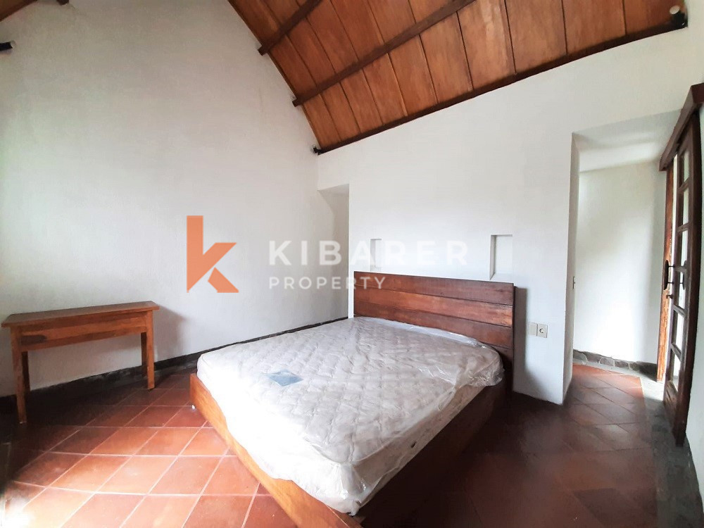 Unique Three-Bedroom Villa with Natural Stone Design and Forest in Umalas — image 13