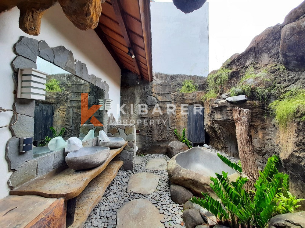 Unique Three-Bedroom Villa with Natural Stone Design and Forest in Umalas — image 16