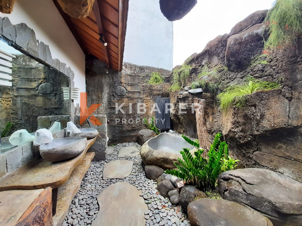 Unique Three-Bedroom Villa with Natural Stone Design and Forest in Umalas — image 18