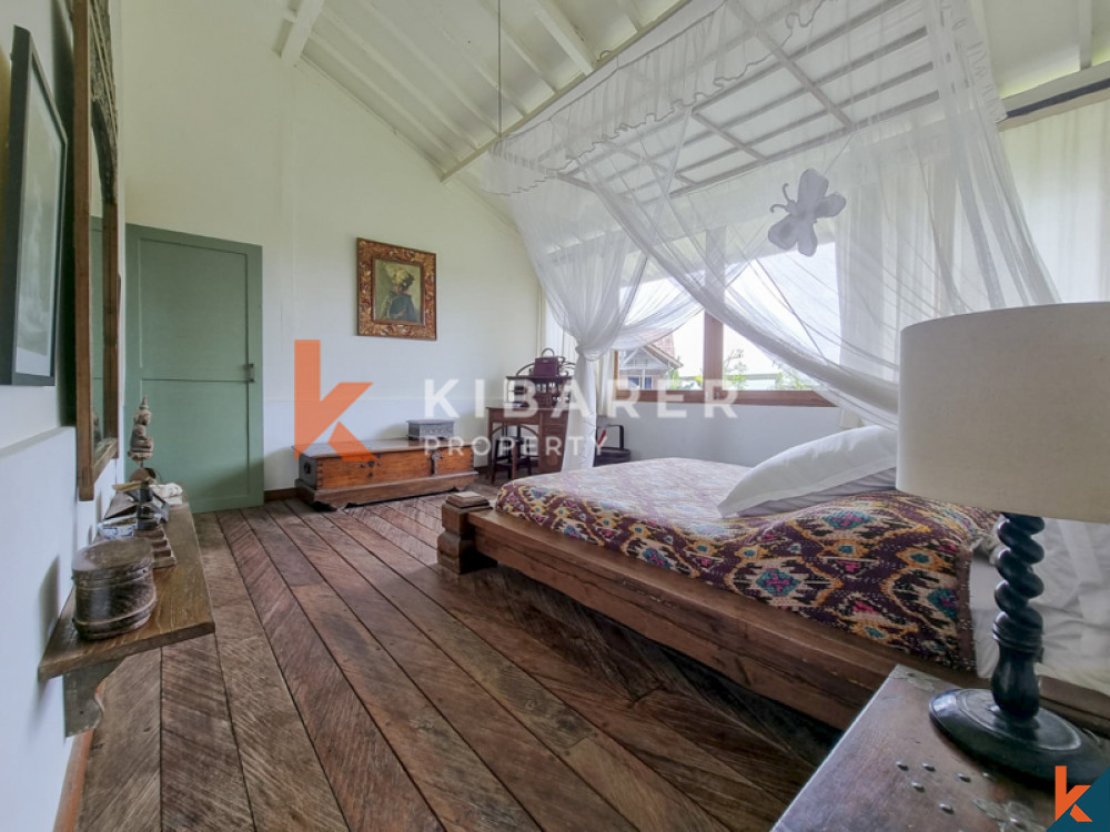 Traditional Four-Bedroom Joglo with Rice Field Views in Cemagi — image 16