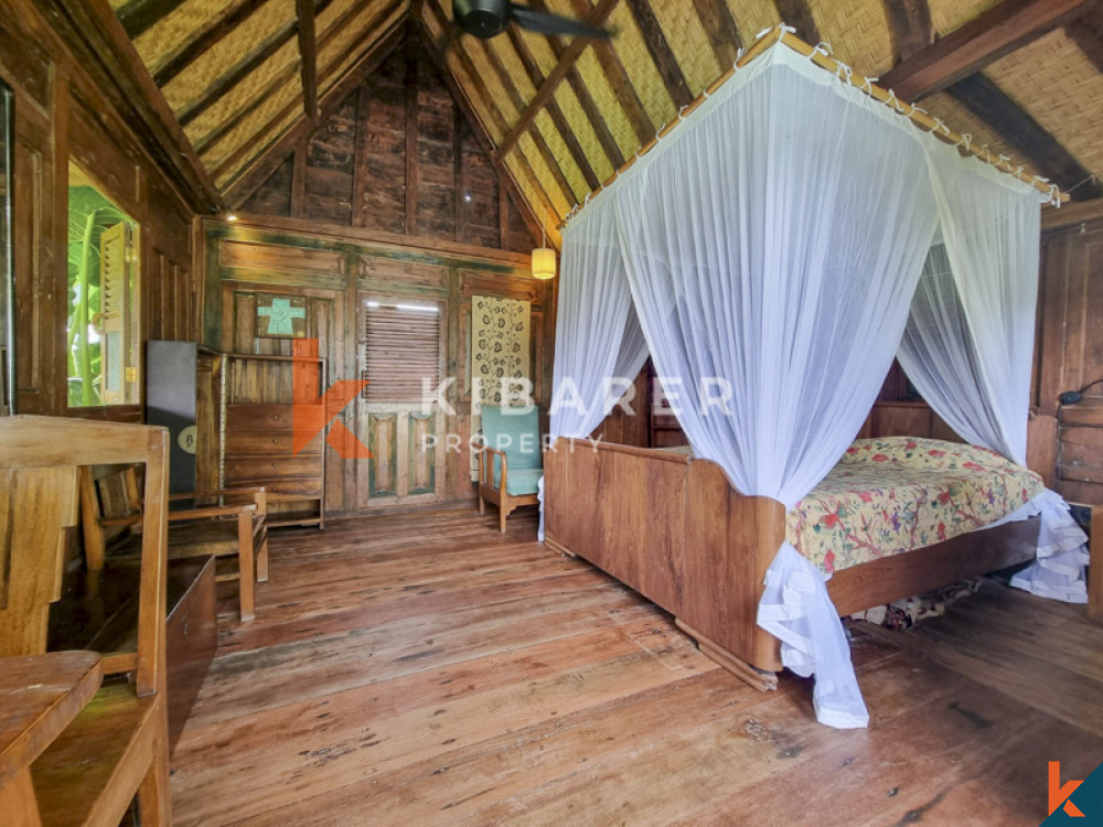 Traditional Four-Bedroom Joglo with Rice Field Views in Cemagi — image 4