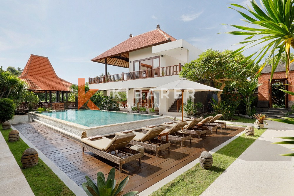 Luxury Rustic Charm Six-Bedroom Enclosed Living Room Villa Situated in Canggu — image 1