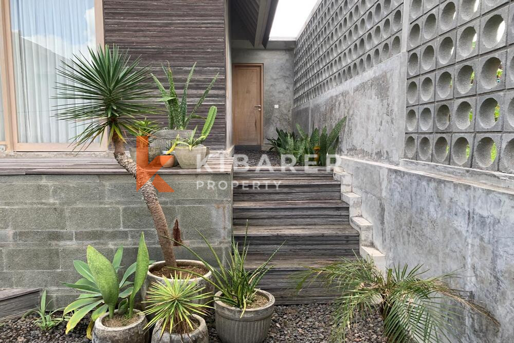Charming Three-Bedroom Industrial Open Living Room Villa in Canggu — image 7