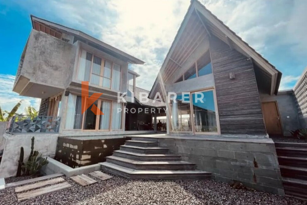 Charming Three-Bedroom Industrial Open Living Room Villa in Canggu — image 1