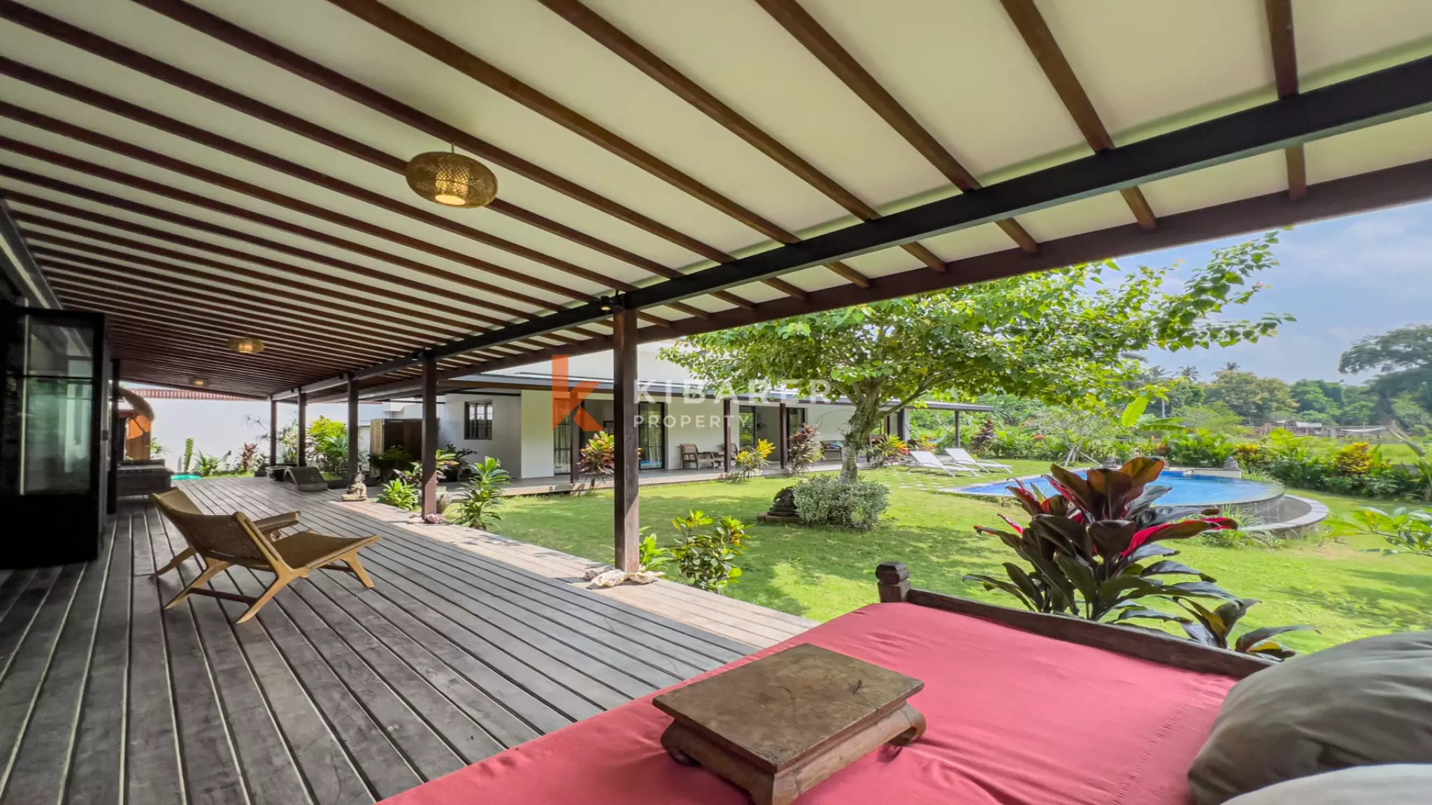 Elegant Four-Bedroom Villa with Enclosed Living Room, Pool & Lush Garden — image 8
