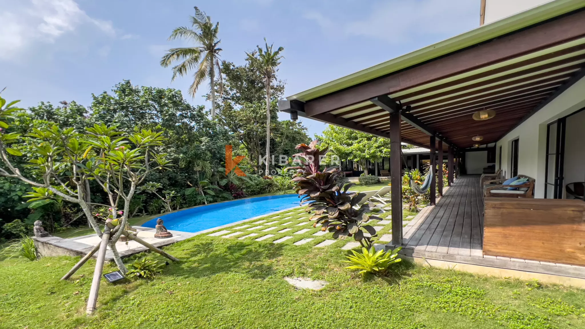 Elegant Four-Bedroom Villa with Enclosed Living Room, Pool & Lush Garden — image 3