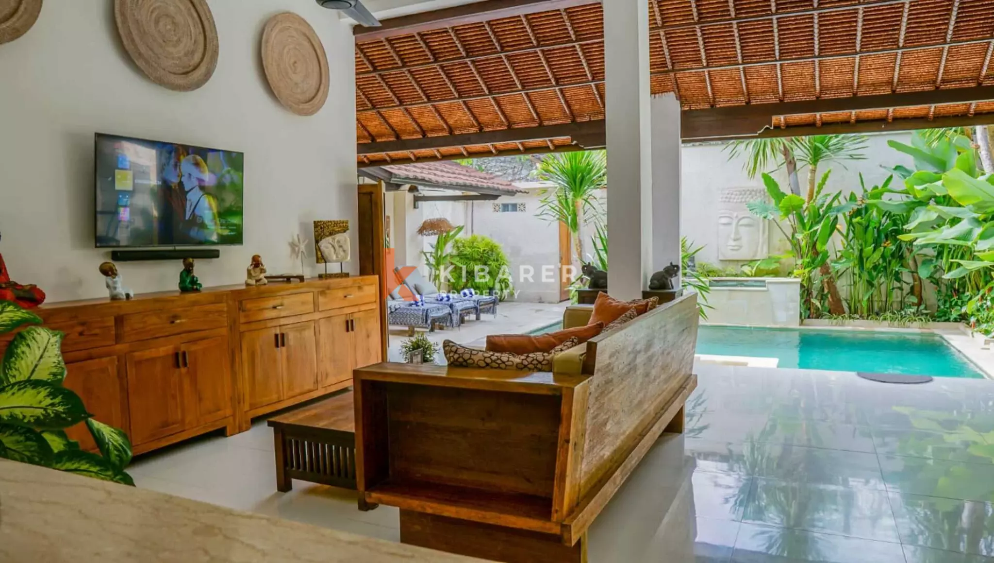 Traditional Open Living Room Three-Bedroom Villa with Tropical Touch in Mertanadi — image 7