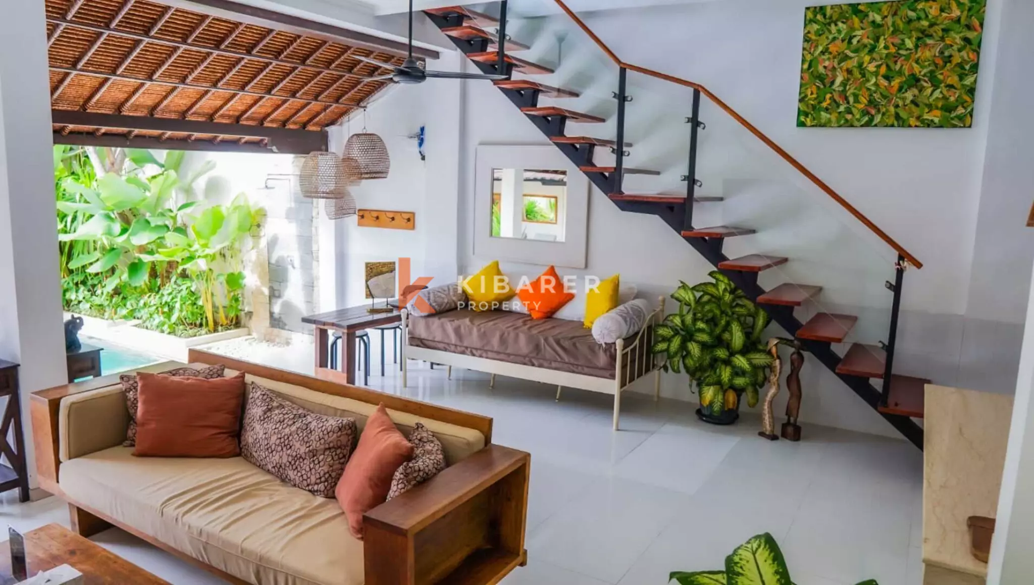 Traditional Open Living Room Three-Bedroom Villa with Tropical Touch in Mertanadi — image 4