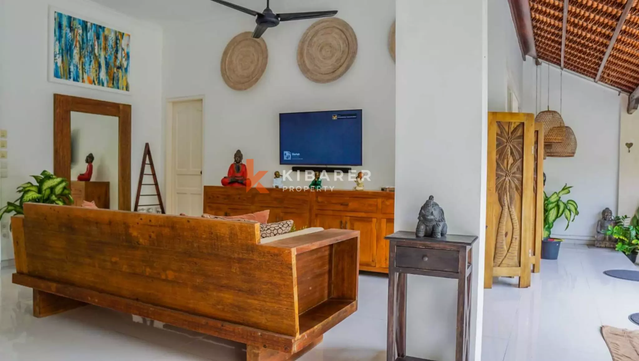 Traditional Open Living Room Three-Bedroom Villa with Tropical Touch in Mertanadi — image 3