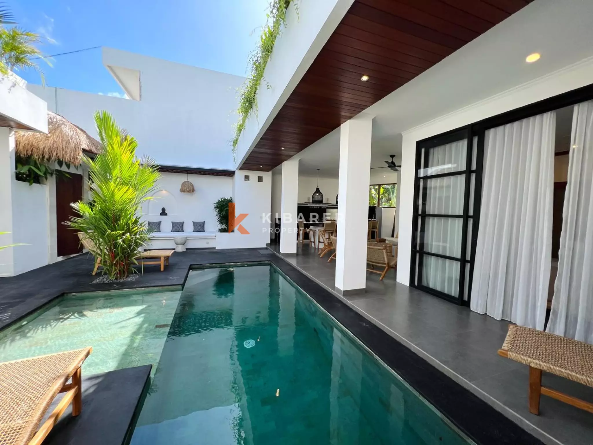Three-Bedroom Tropical Modern Style Villa with Open Living Room & Rooftop Terrace in Tumbak Bayuh — image 1