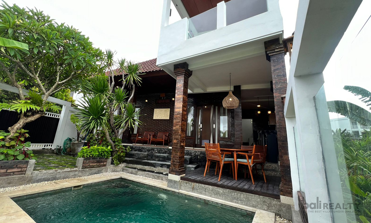 Exclusive Yearly Rental Opportunity: Two-Bedroom Balinese Tropical Villa in Prime Canggu Locale with Breathtaking Sunset Views